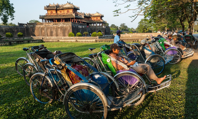 Cyclo drivers in Hue (Dreamstime)